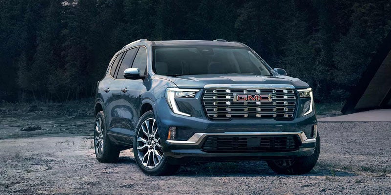2026 GMC Acadia driving performance showcasing turbo engine and AWD capability